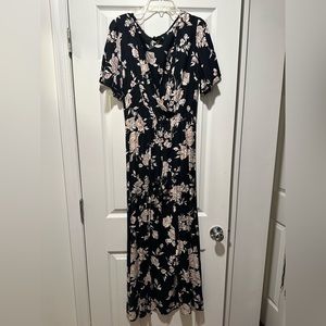 Women’s romper with dress overlay